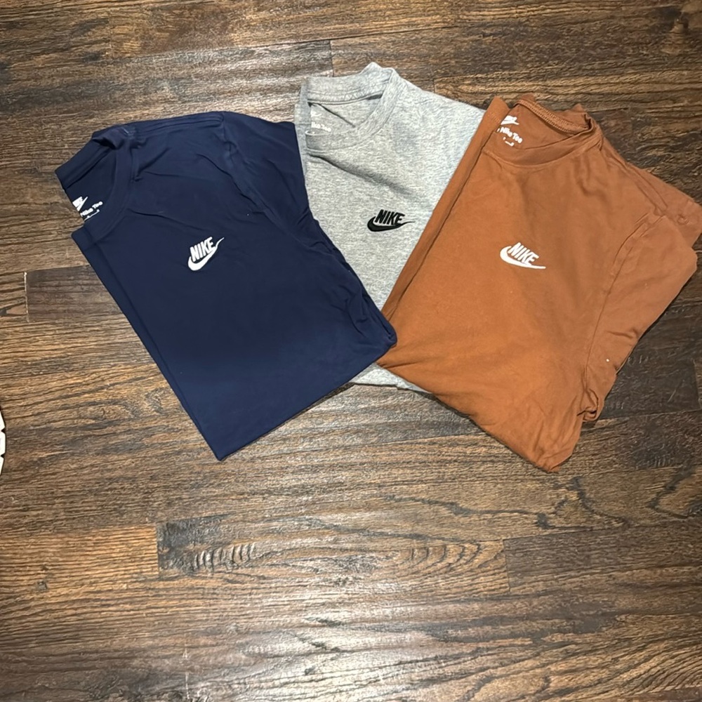Nike T-Shirts in Navy, Heather Gray, and Rust